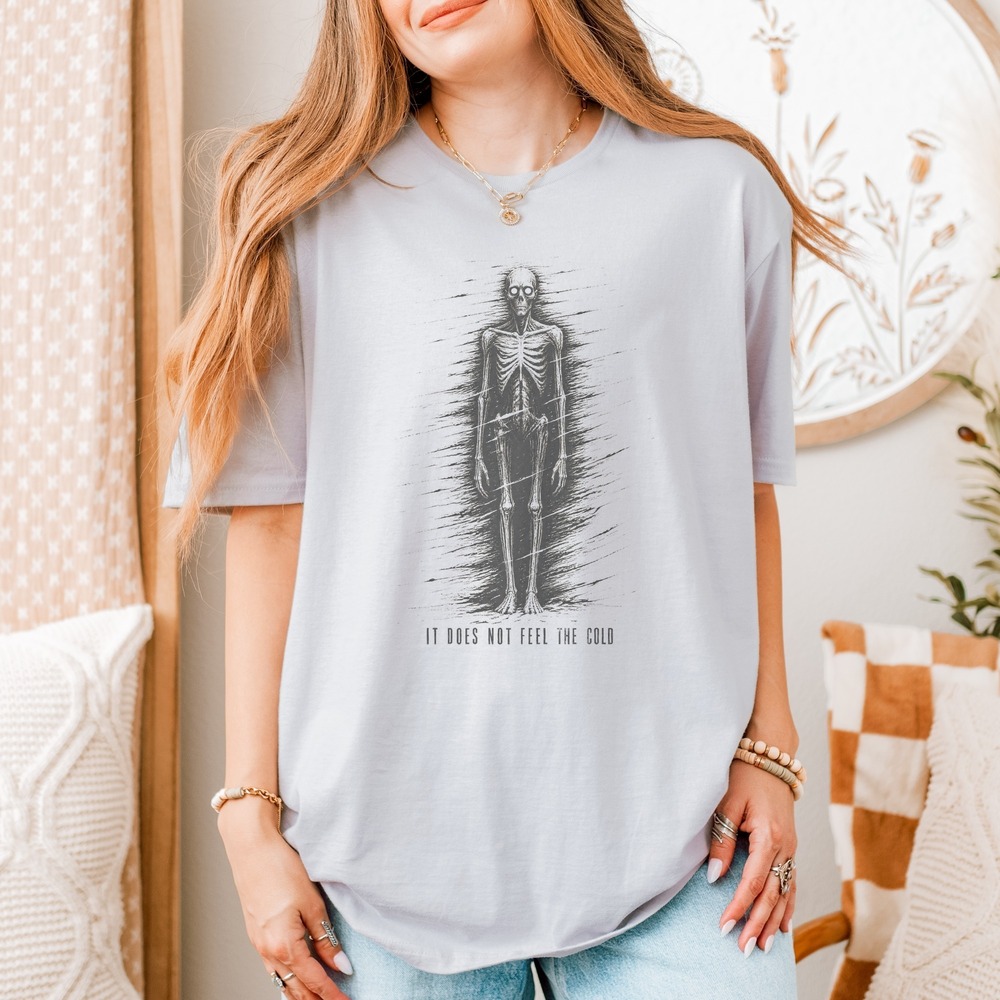 It Does Not Feel the Cold Skeleton Stalking the Blizzard Tee